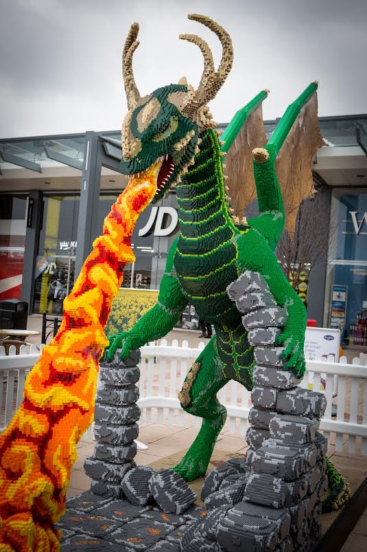 A 3metrehigh LEGO dragon sculpture is greeting shoppers