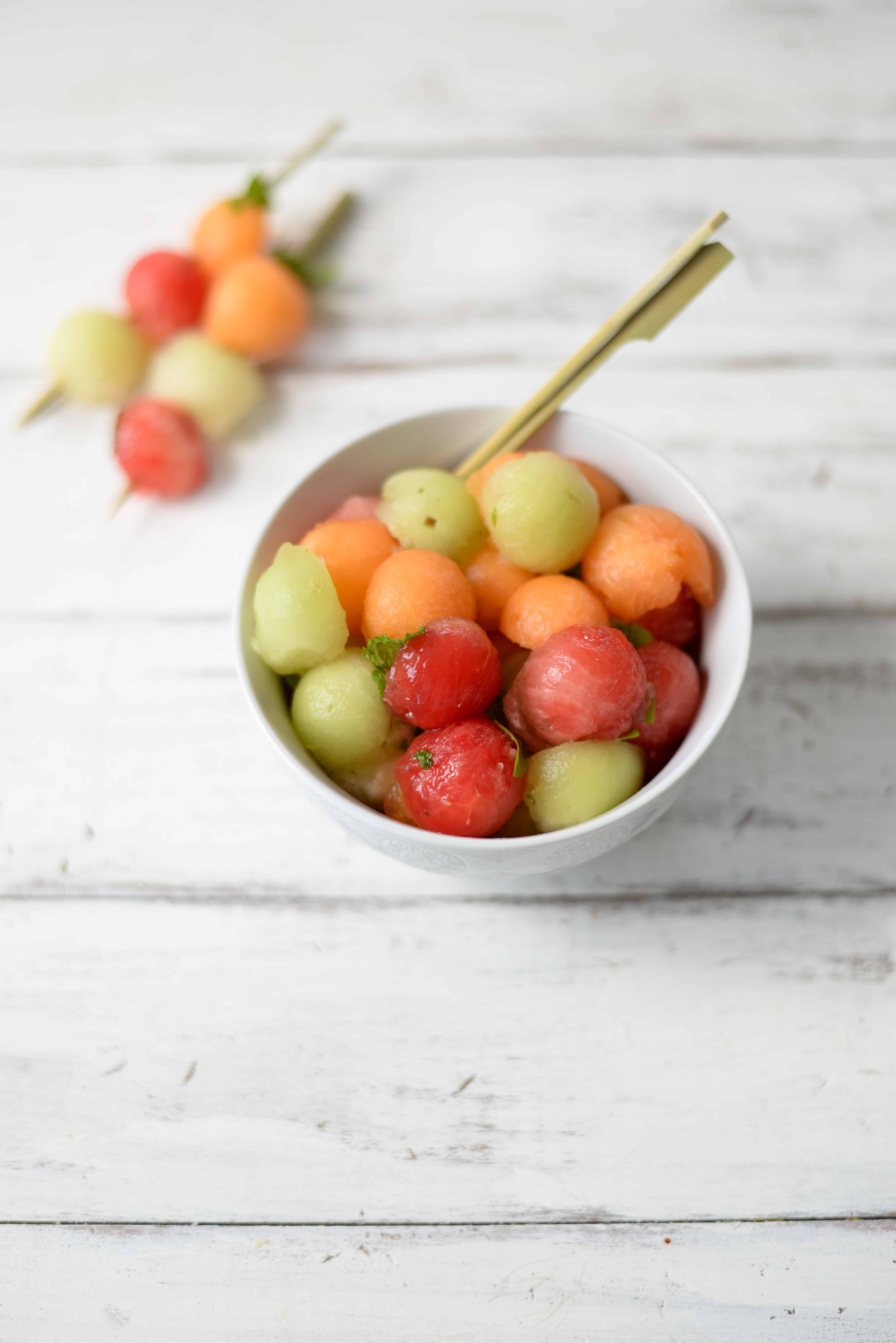 Melon Ball Skewers with BasilMint Dressing Delish Knowledge