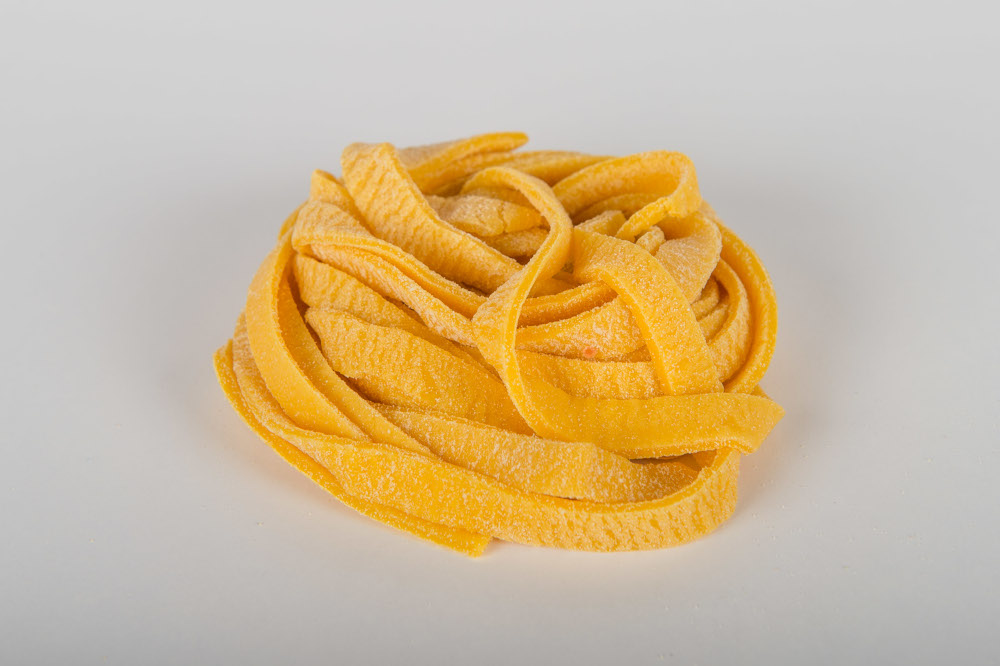 Tagliatelle di Pasta Fresca Fatte a Mano. Gastronomia a Faenza e Russi