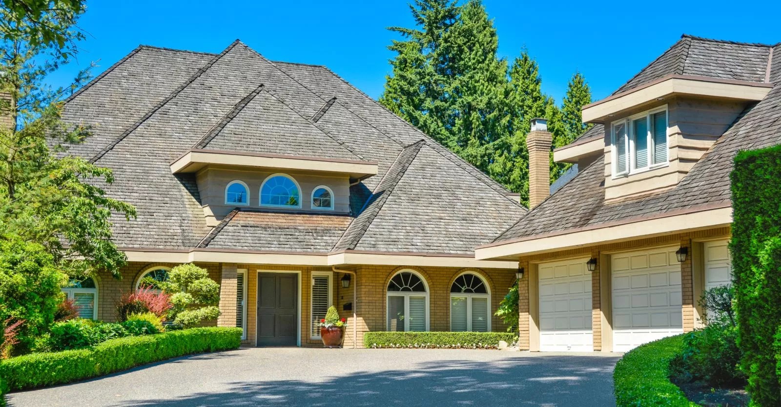 How Much Does The Pressure Wash Roof Cost DeMark's Window