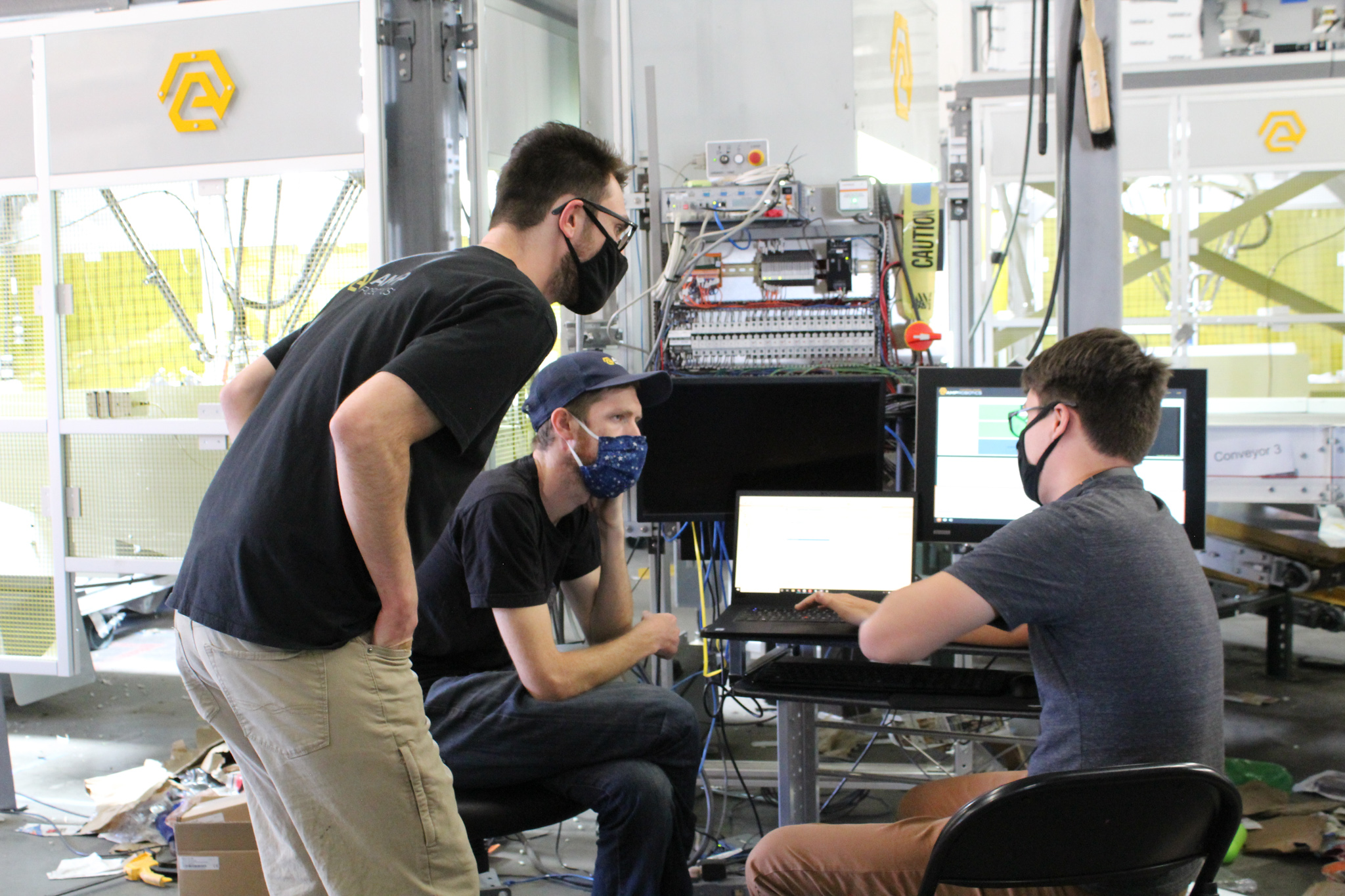 AMP Robotics team members on the job