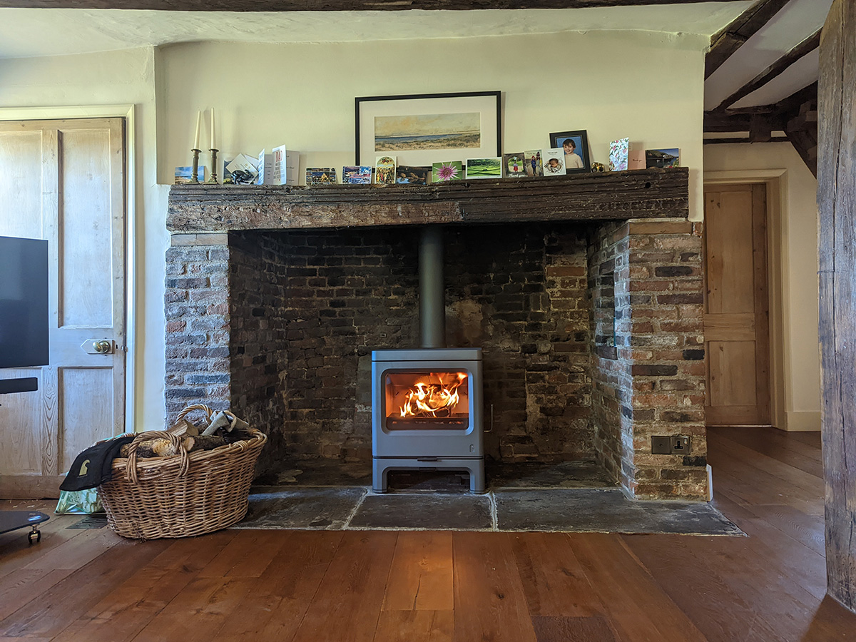 Inglenook Fireplace with a Wood Stove Installed Scarlett Fireplaces