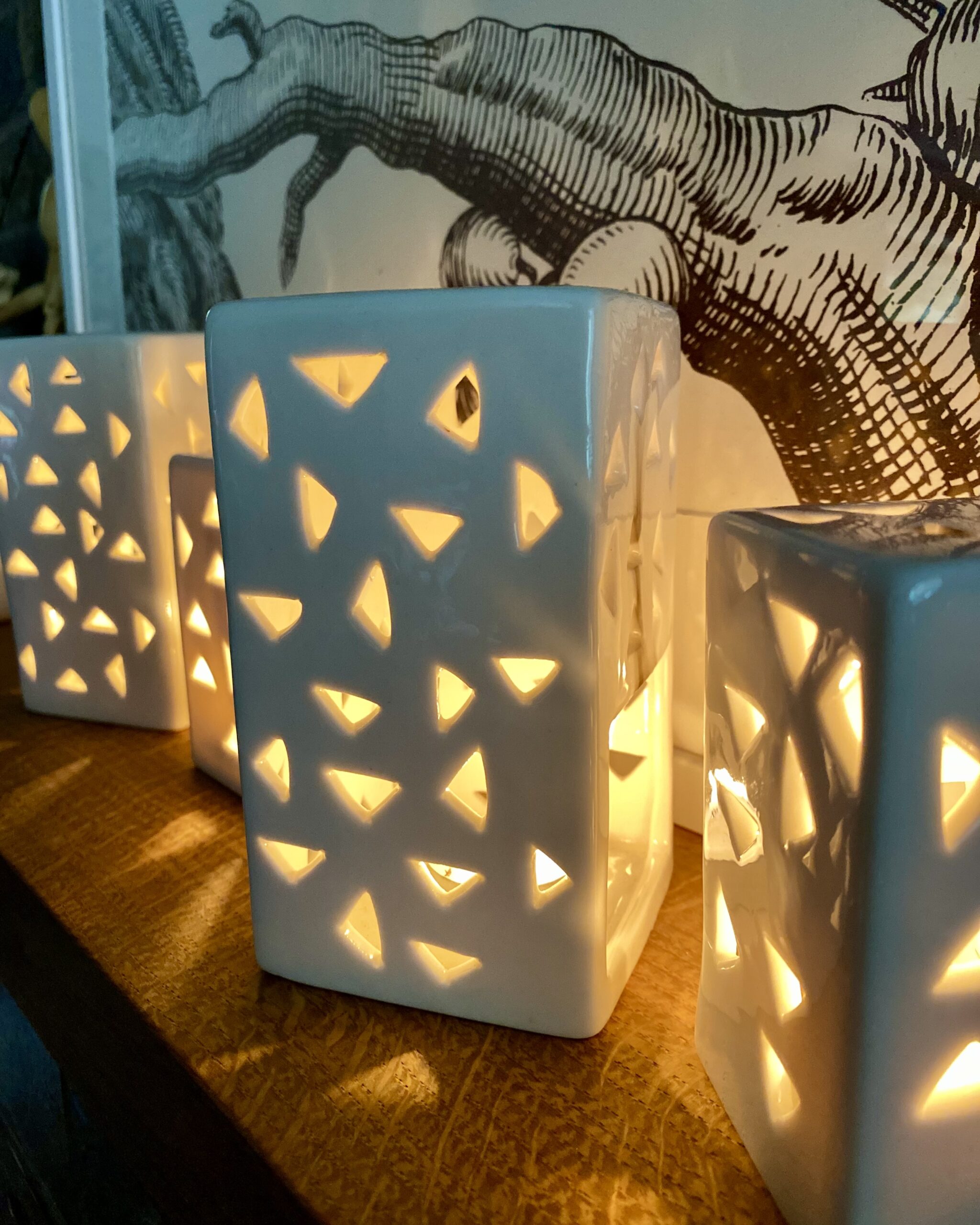 Tea light holders in white ceramic with geometric cutouts Designs By