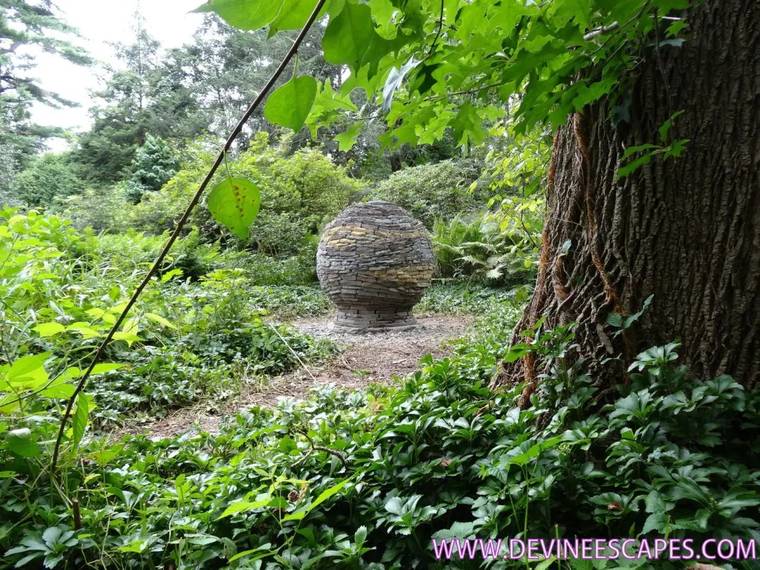 building a dry stone sphere stone art land art zero mortar