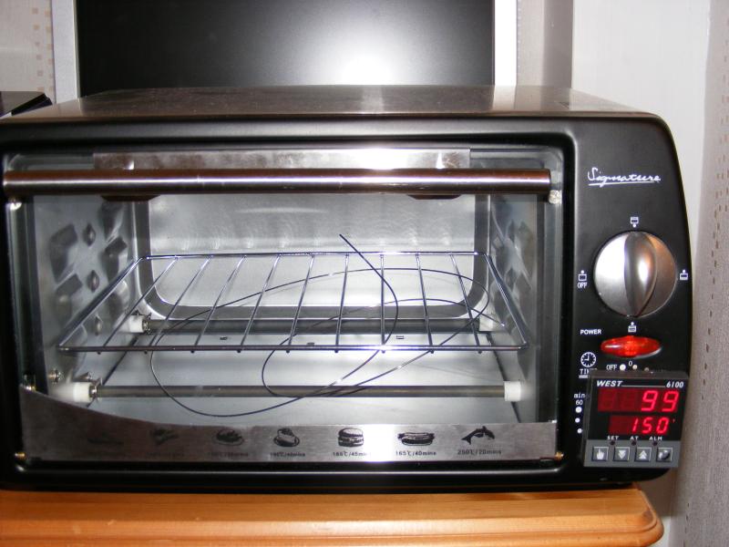 Conversion of toaster oven to SMT reflow oven using cheap PID controller.