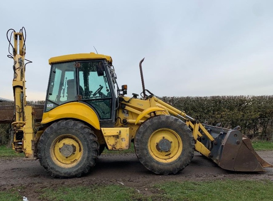 Digger Bidder 2002 New Holland LB115 backhoe loader 3 buckets
