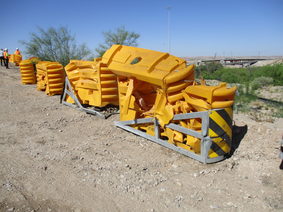 Wrecked crash attenuators wall