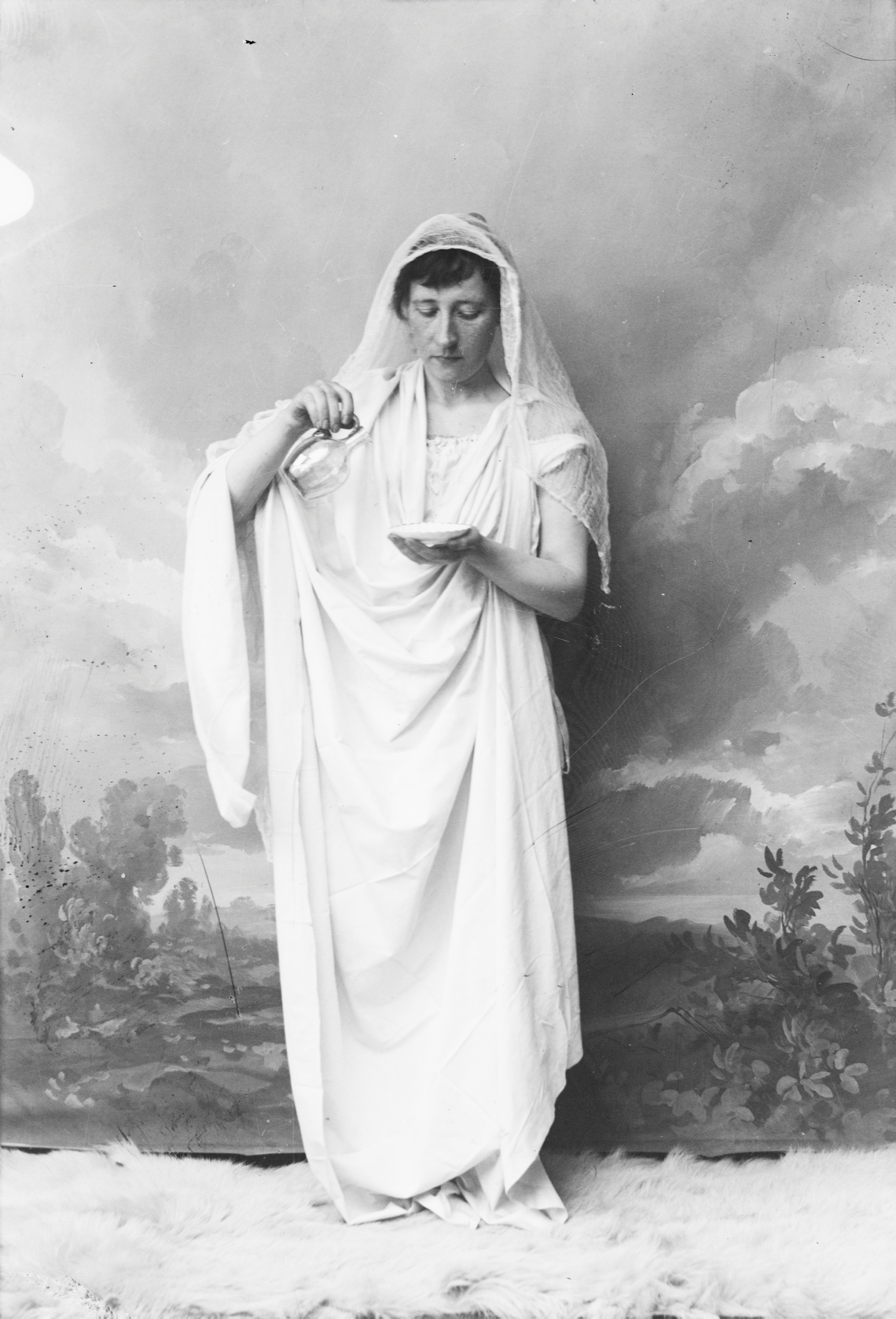 A Portrait of Bolette Berg Pouring Water into a Dish Digital