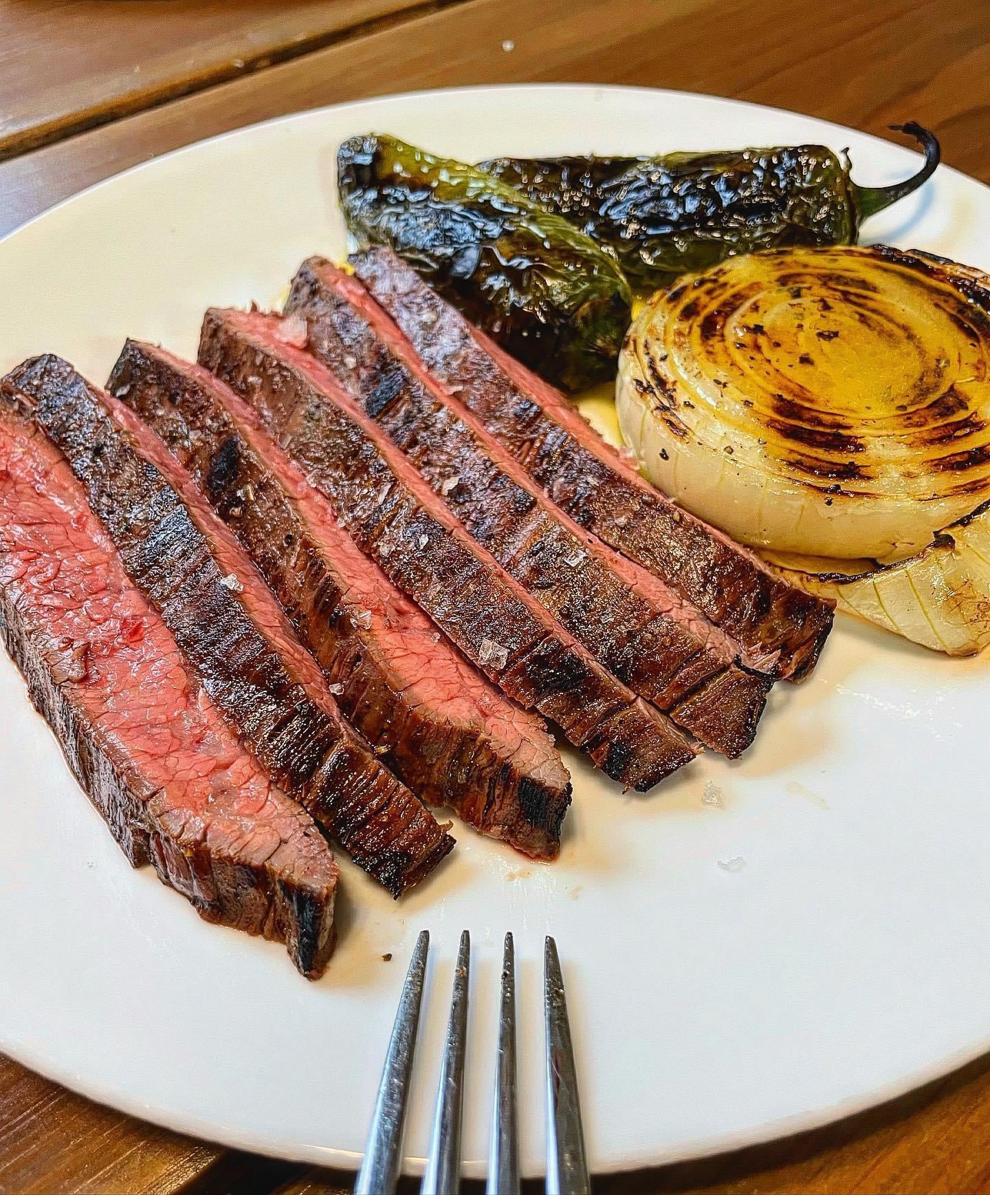 [homemade]Flank steak, onion, and jalapeños. Orange vinaigrette over