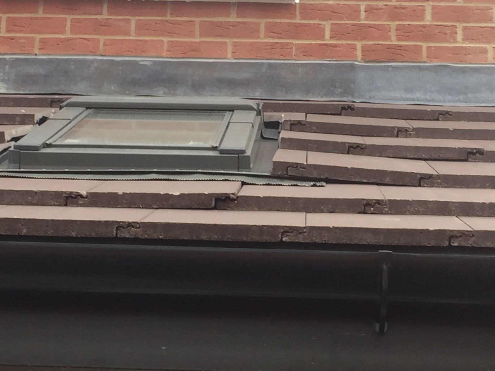 tiling around two velux windows look messy, is it done correctly