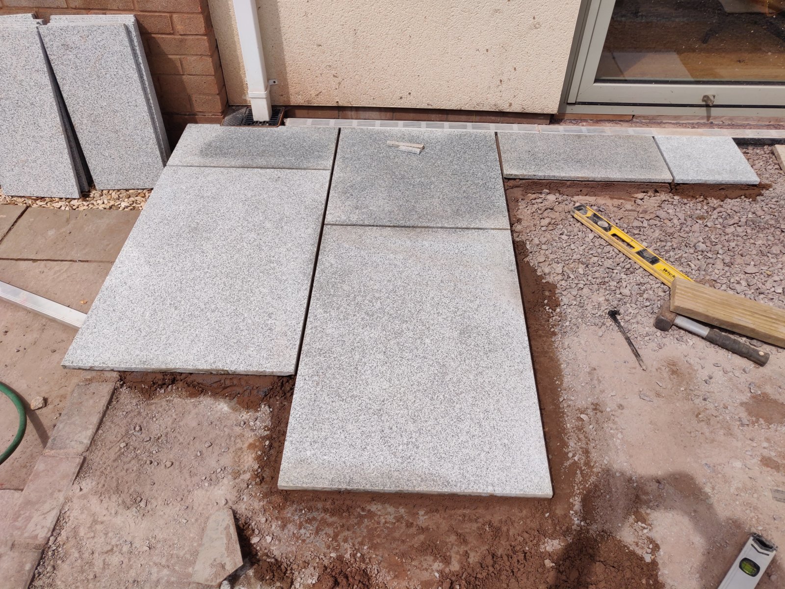 New Granite Patio Staining through SBR slurry within a few hours