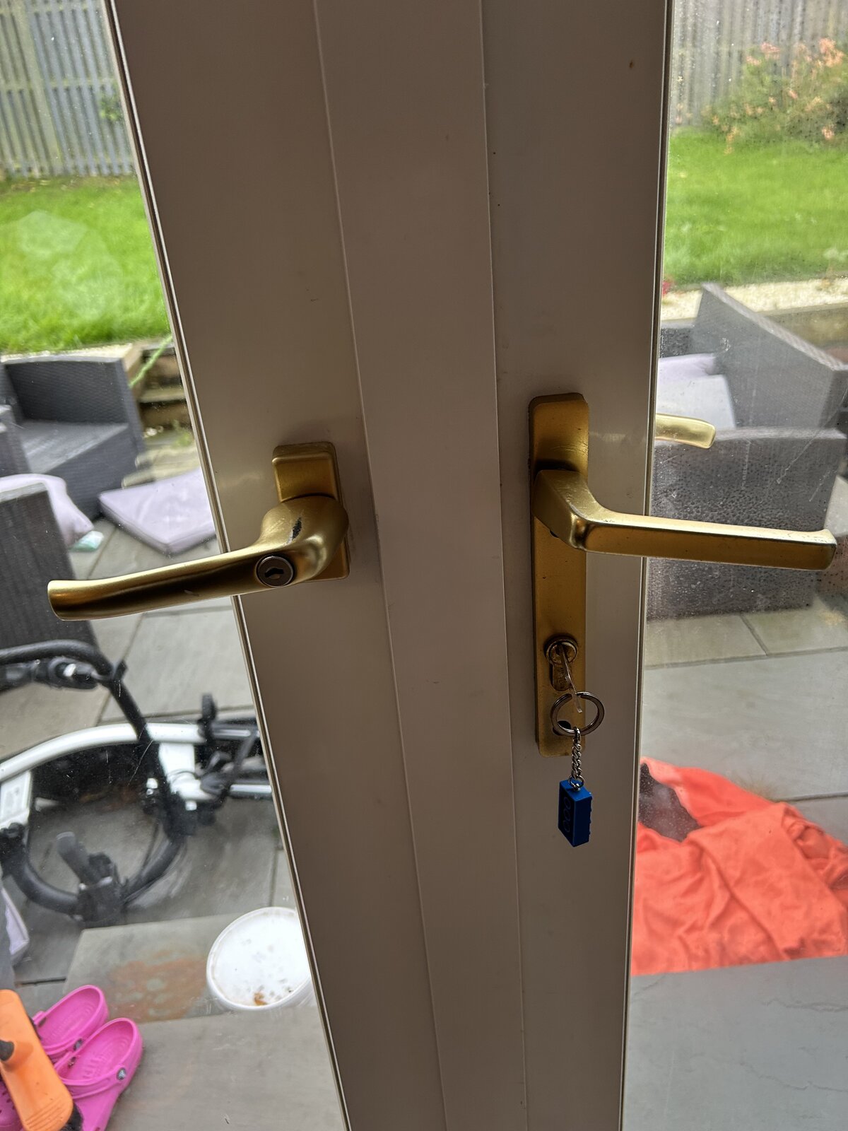 Weird French doors with window handle and standard door handle... DIYnot Forums