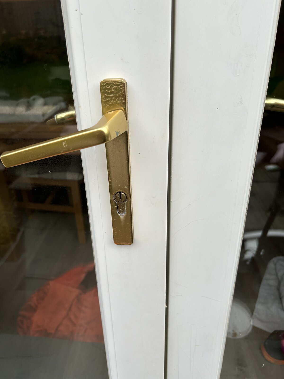 Weird French doors with window handle and standard door handle... DIYnot Forums