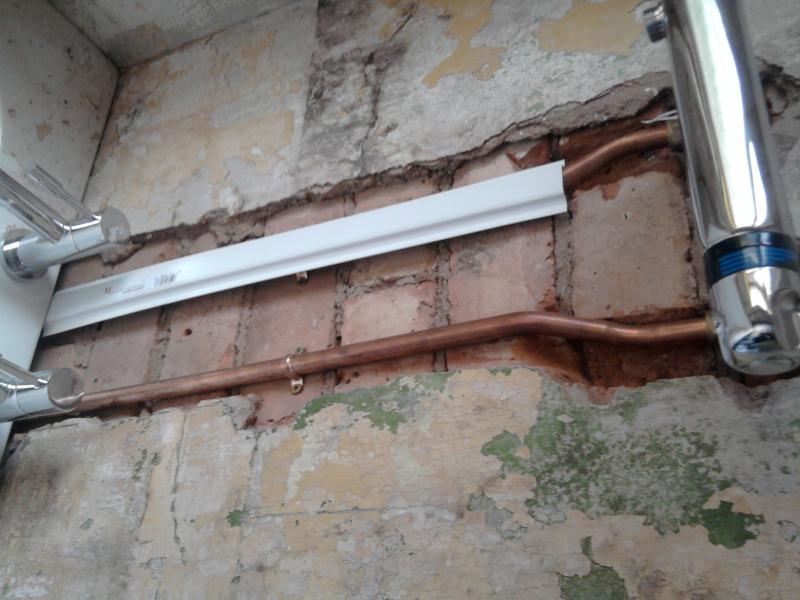 Copper pipes in wall behind tiles DIYnot Forums