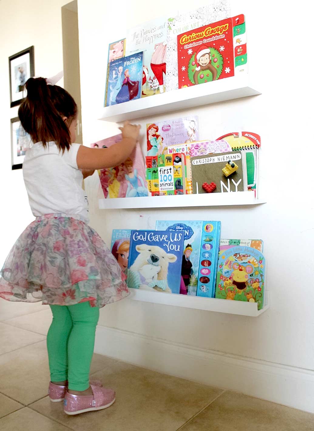 Wall shelves solution for toddler by South Florida Interior Designer