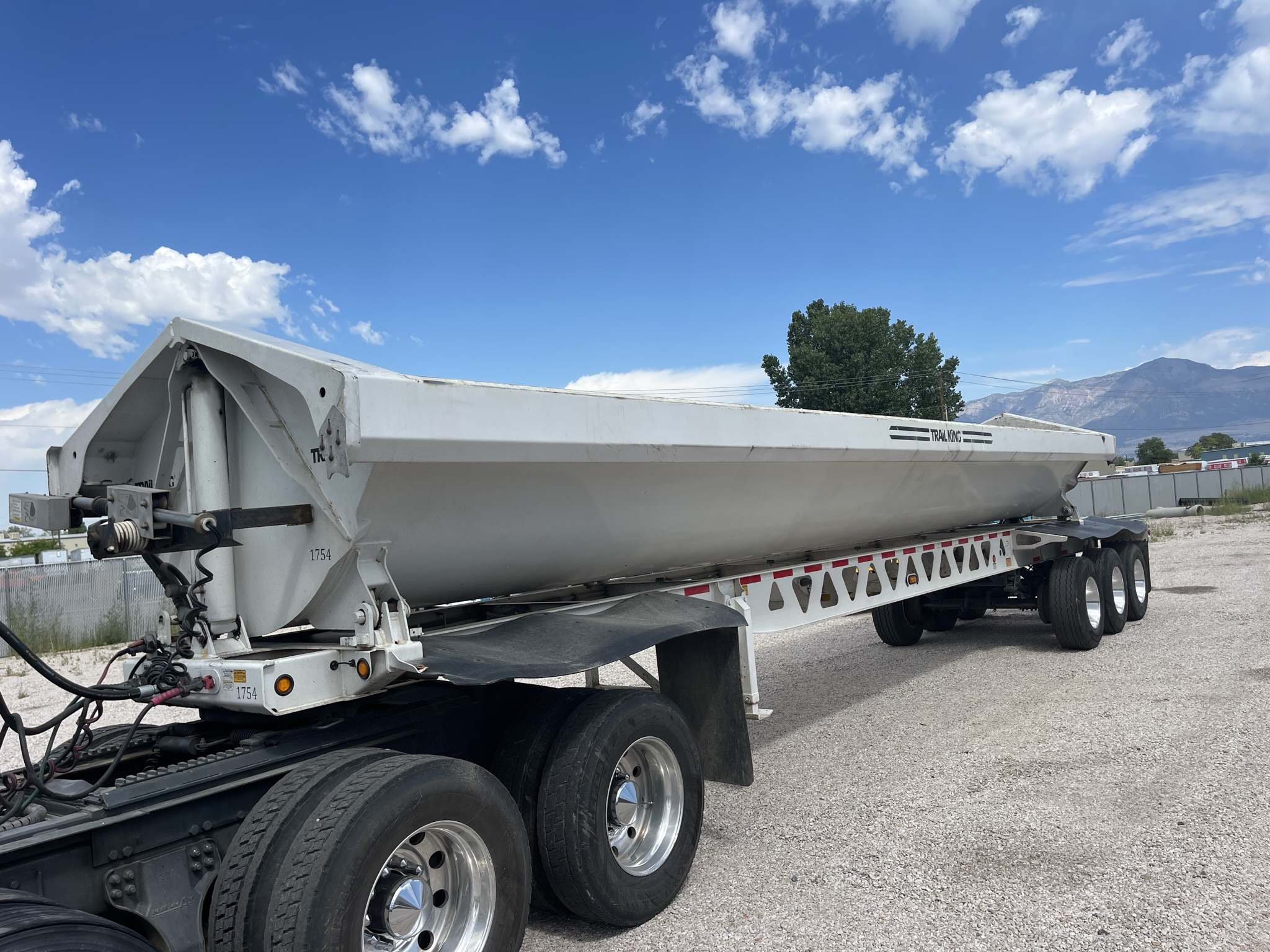 TK60SSD433 TRIPLE AXLE SIDE DUMP TRAILER Dogface Heavy Equipment