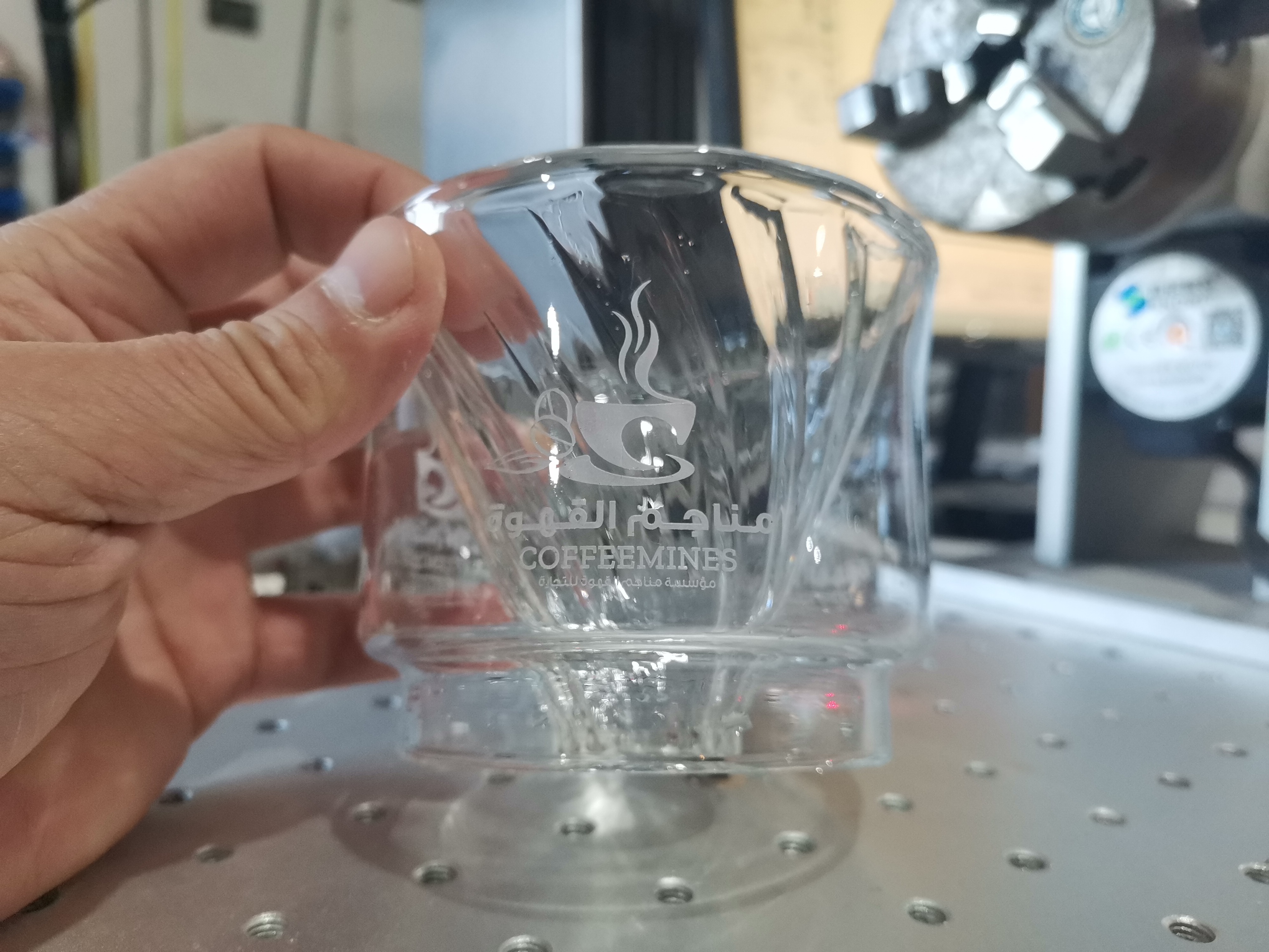 News Marking Logo On Glasses For A Customer Who Owns A Coffee Shop.