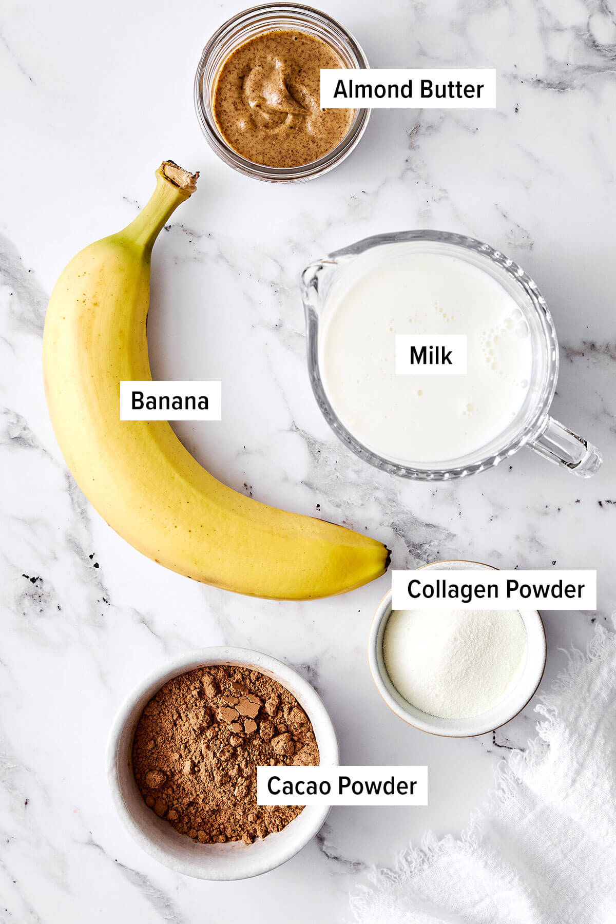 Ingredients for a chocolate collagen smoothie.