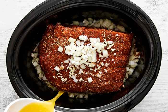Cooking pulled pork in slow cooker.