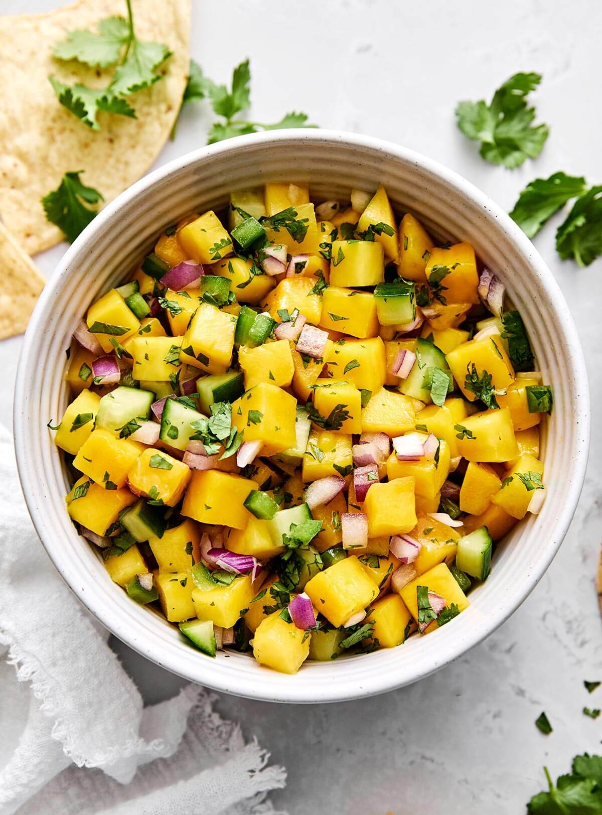 A bowl of fresh mango salsa.