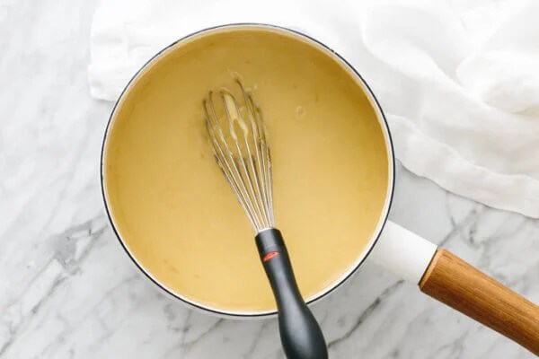 Thickened banan pudding on the stove.