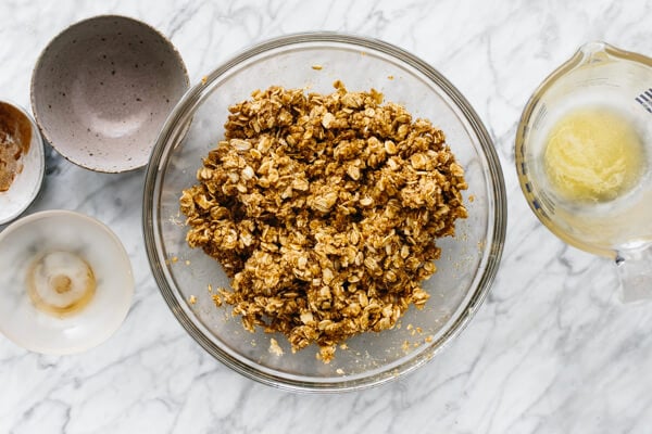 Topping mixed together with wet ingredients and clumpy in a bowl.