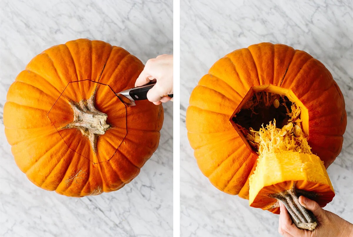 Pumpkin being carved to roast pumpkins seeds.