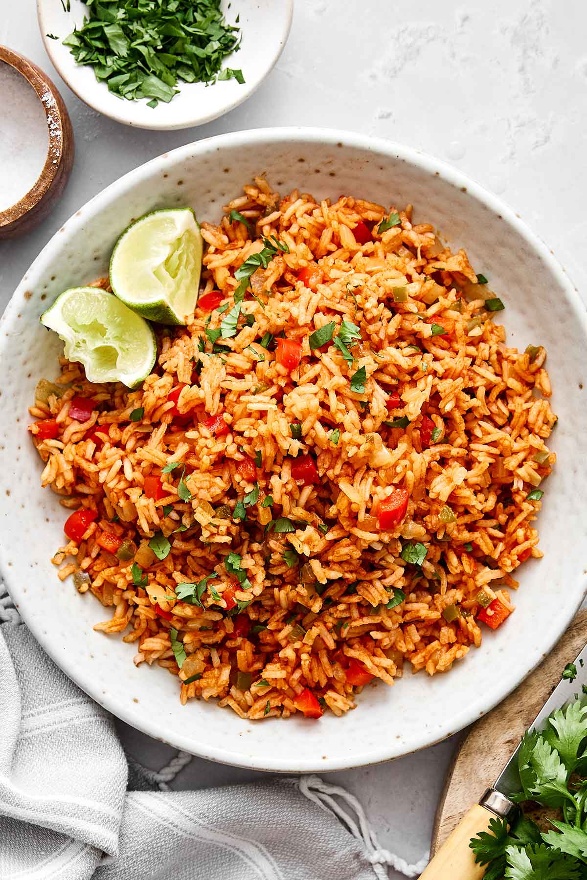 This Mexican rice is the perfect side dish for your dinner spread! It's layered with authentic flavor, really easy to make, and loved by all. Mexican rice in a bowl.