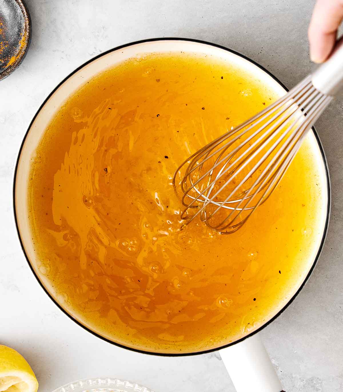 Upgrade your wellness routine with this simple turmeric tea! All you need is ground turmeric, lemon, honey, and black pepper. The first step to making turmeric tea with ground turmeric, lemon, black pepper, and water.