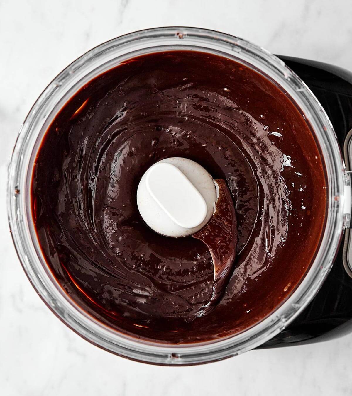Blending chocolate mousse layer.