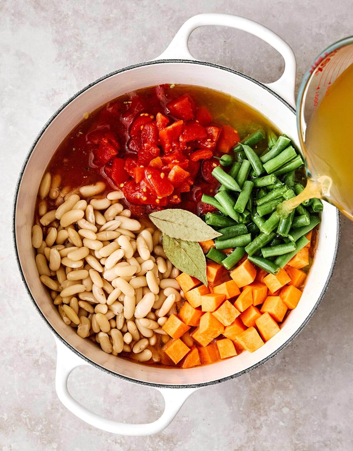 Simmering a minestrone soup.