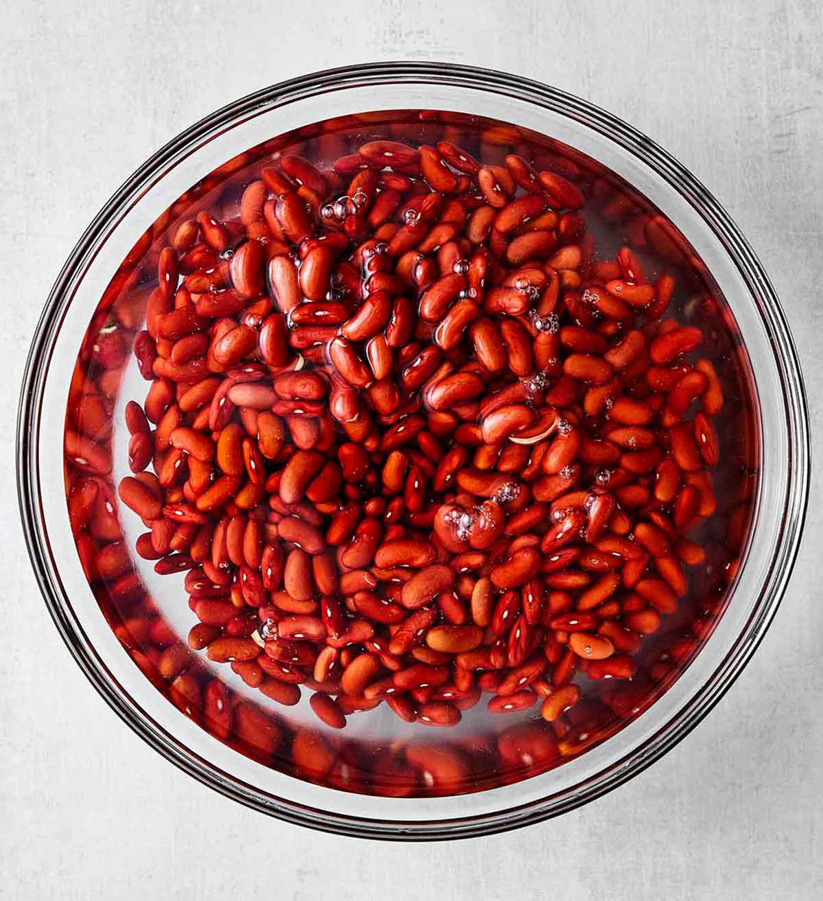 This red beans and rice with sausage is rich with Cajun flavors and perfect for a comforting family dinner. Plus, it's super easy in one pot! Step one of red beans and rice: soak the beans.