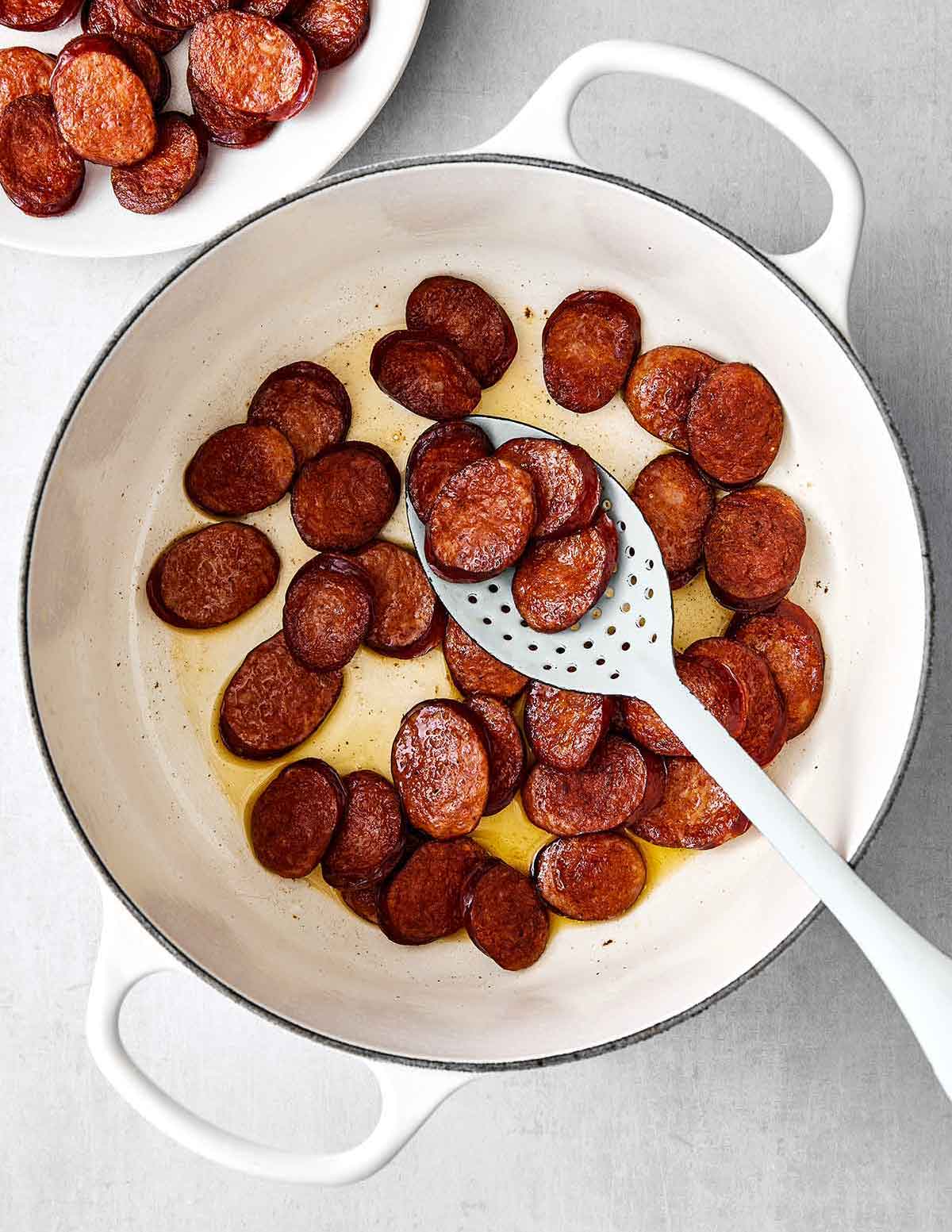 This red beans and rice with sausage is rich with Cajun flavors and perfect for a comforting family dinner. Plus, it's super easy in one pot! Step two of red beans and rice: cook the sausage.