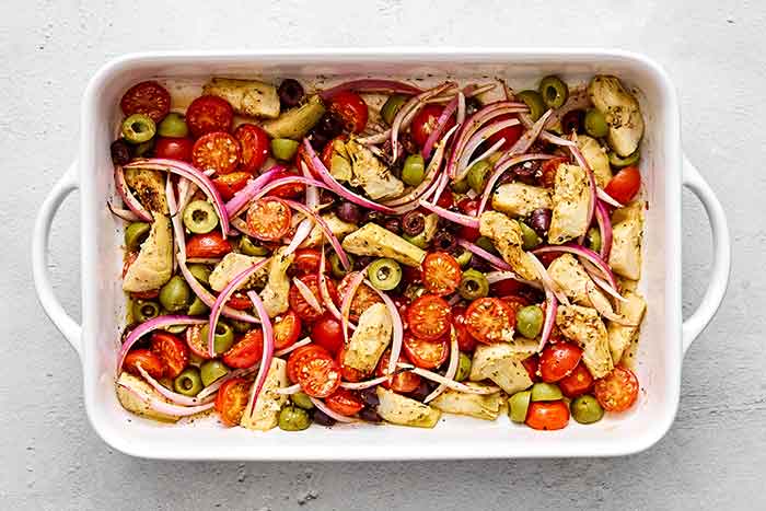 Roasted veggies in a casserole dish.