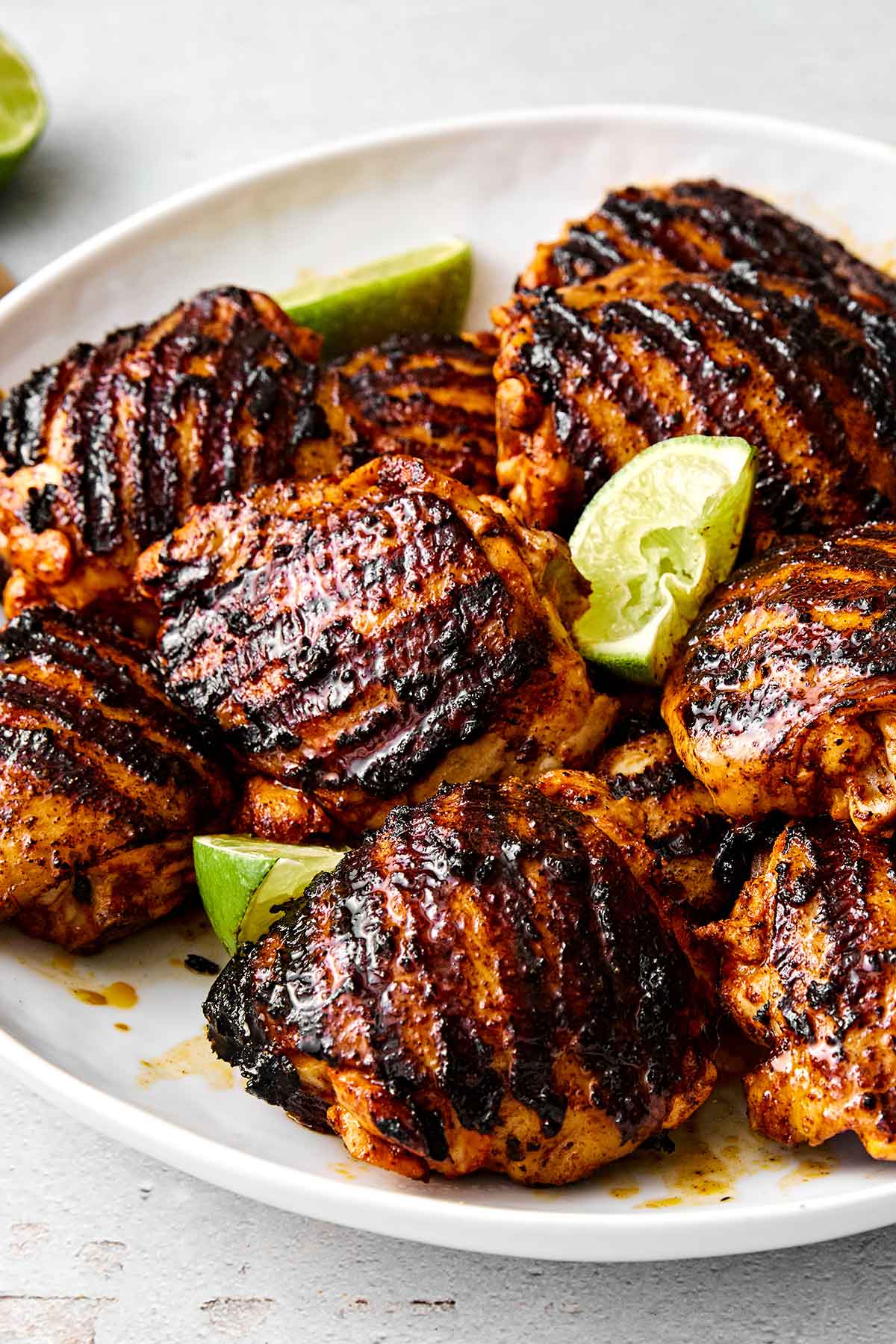 Grilled pollo asado on a plate.