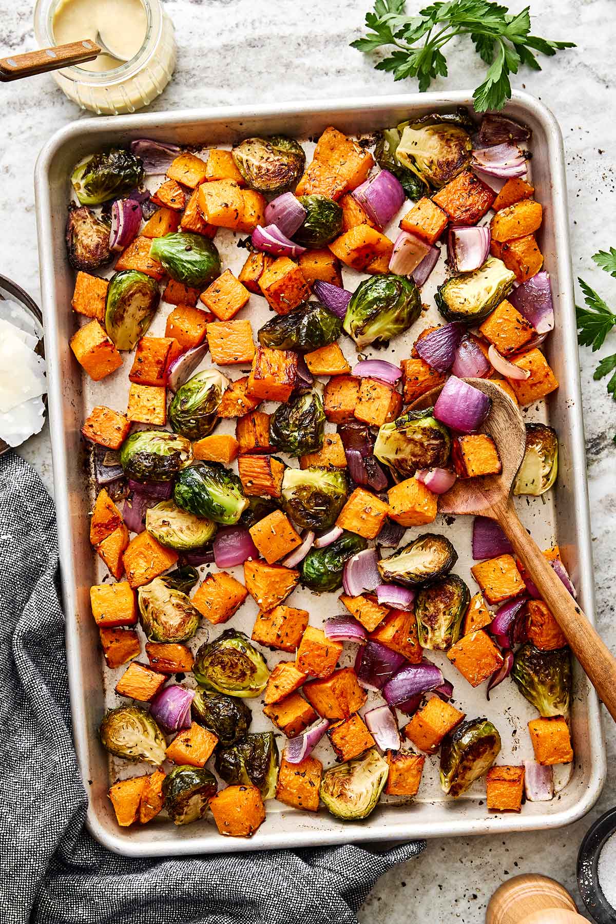 Fall roasted vegetables for the perfect dinner side dish. Fall roasted vegetables on a sheet pan.
