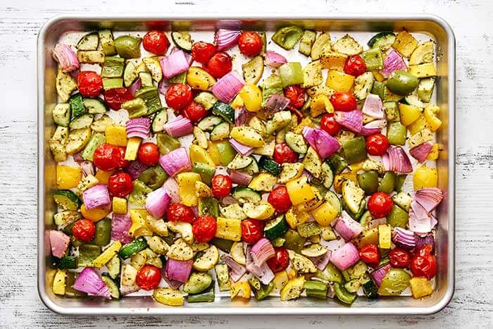 Roasting summer vegetables on a sheet pan.