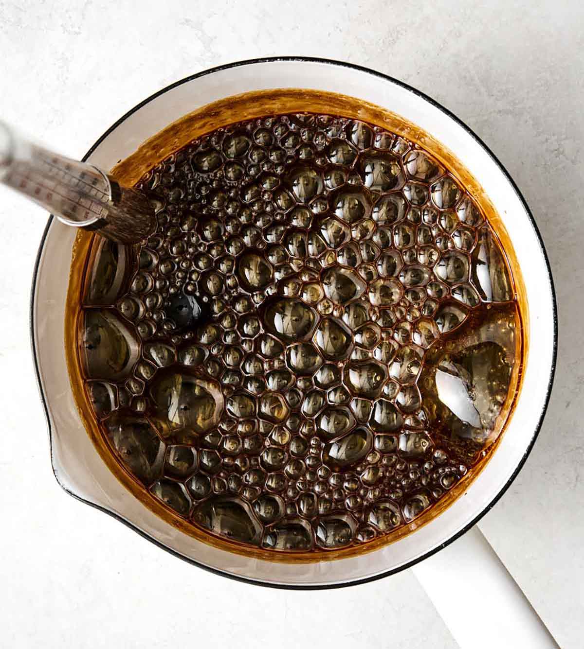 Made with coconut sugar, this silky Spanish flan is a simple twist on the classic dessert with delicious notes of caramel and toffee. Caramelizing coconut sugar in a pot.