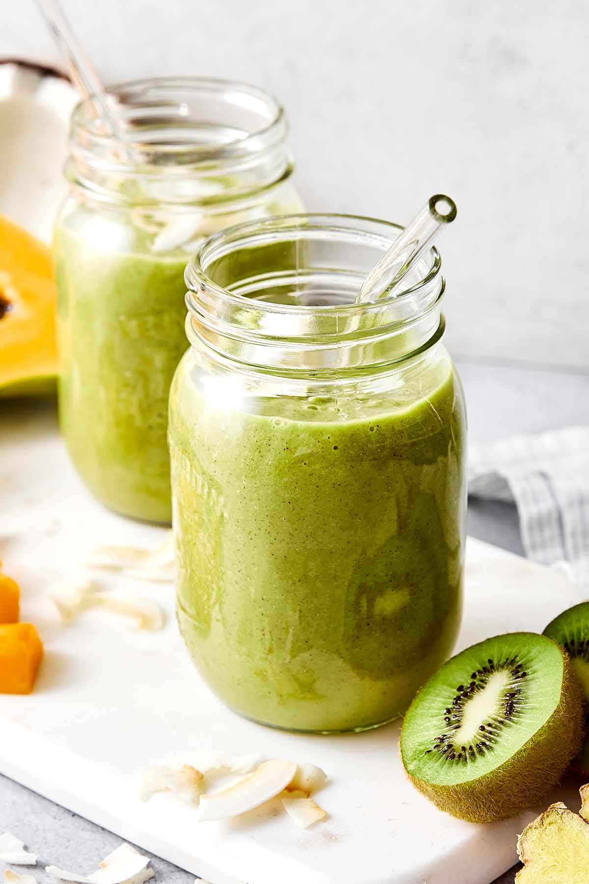 Packed with fiber-rich and hydrating ingredients, this tropical digestive smoothie is great for cleansing your gut and tastes delicious! Tropical digestive smoothies.