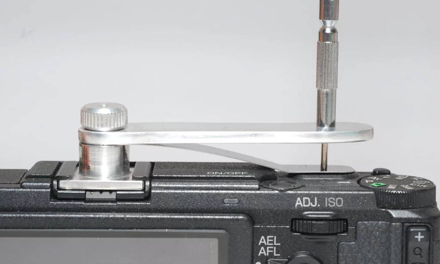 A DIY solution to adding a mechanical cable release to digital cameras