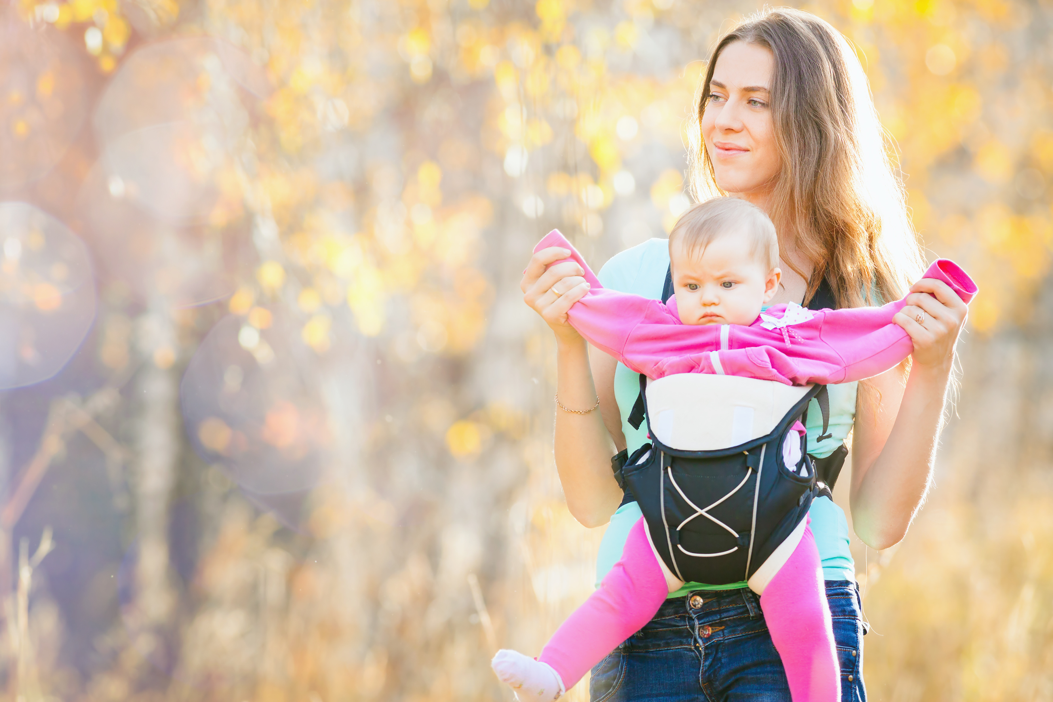 baby carriers and hip dysplasia in less than 300 words. Keep it simple