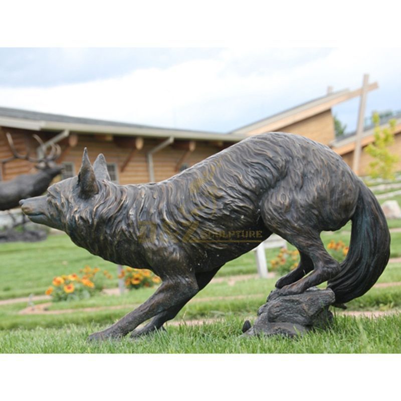 A pair of outdoor life size wolf statues for sale