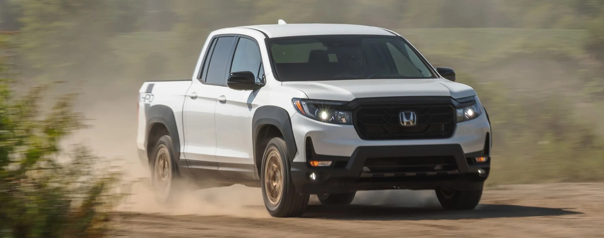 2023 Honda Ridgeline vs 2023 Nissan Frontier Truck Comparison