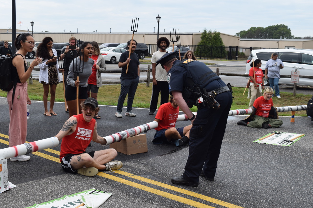 14 Arrested as ClimateJustice Activists Block Airport Traffic The