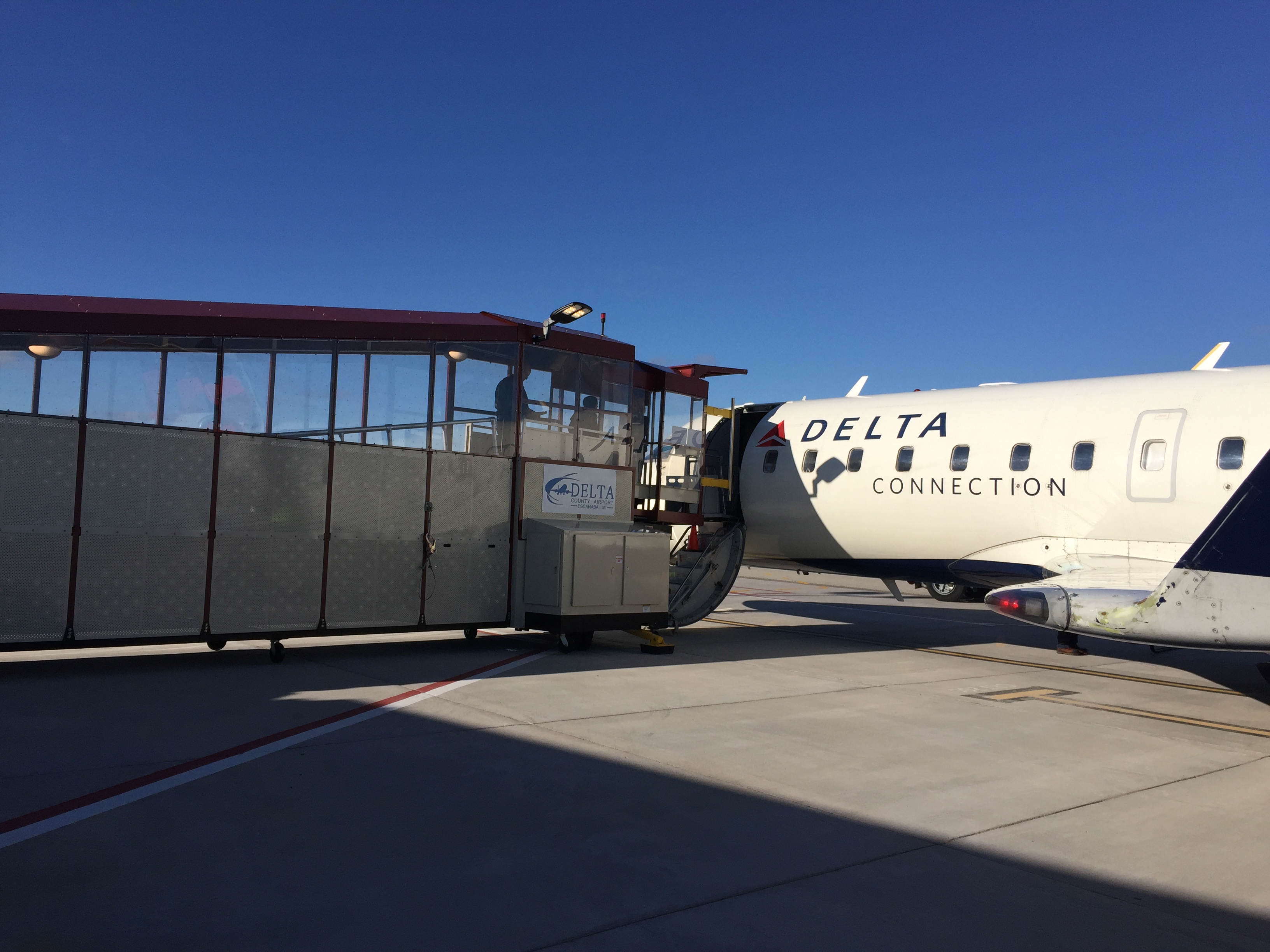 Escanaba to EAST ISLAND AVIATION SERVICES, Inc.