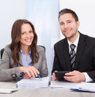 two professional person smiling together