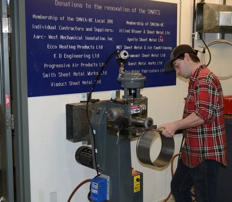 Apprentices using Empire’s EMT7R Power rotary machine in BC's Sheet