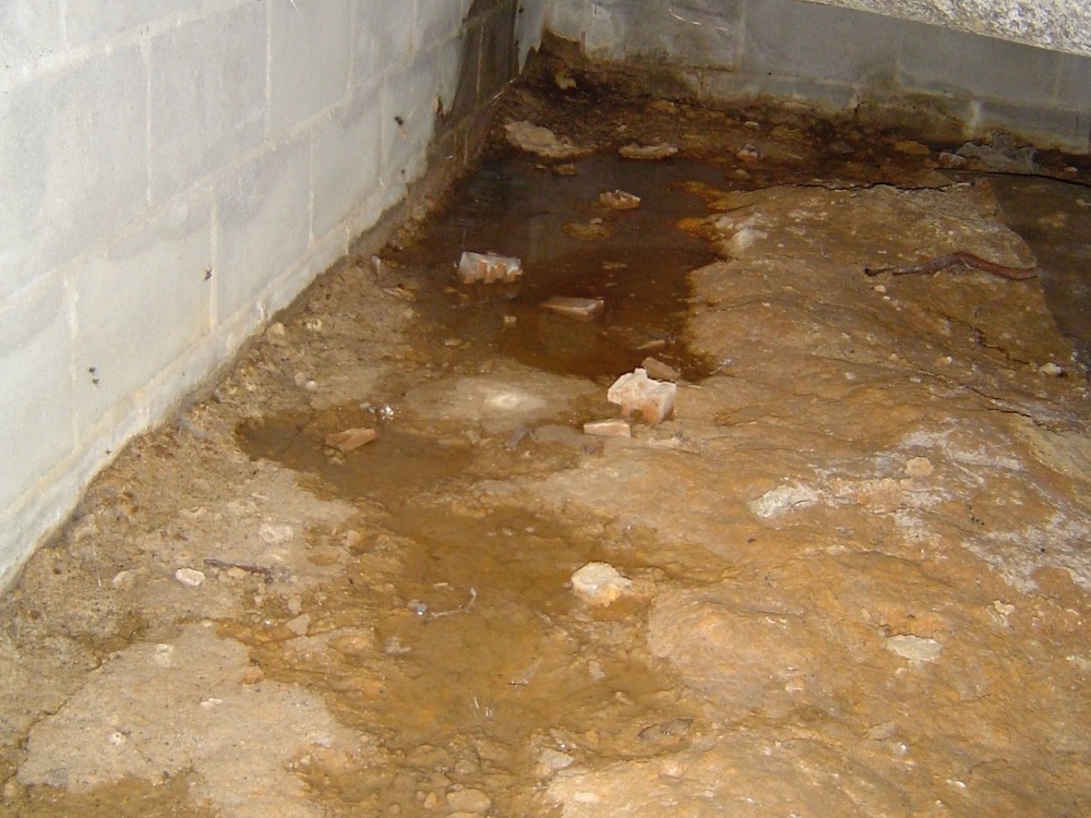 Bulk water problems in a crawl space should not be covered up Energy Vanguard