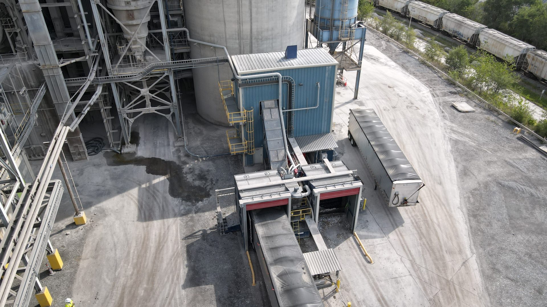 Alternative fuel feed system for cement kilns