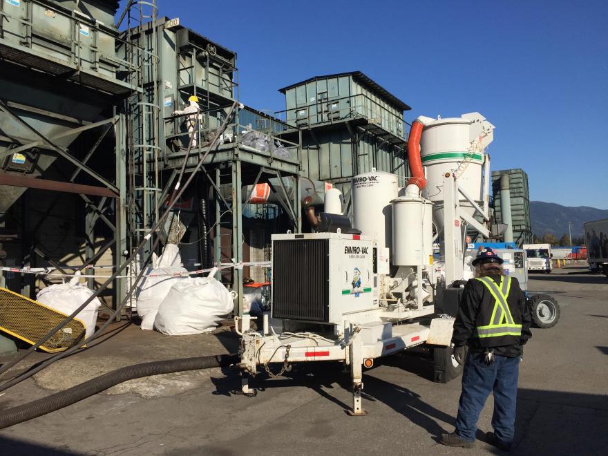 HEPA vacuum loaders to contain toxic dust and asbestos